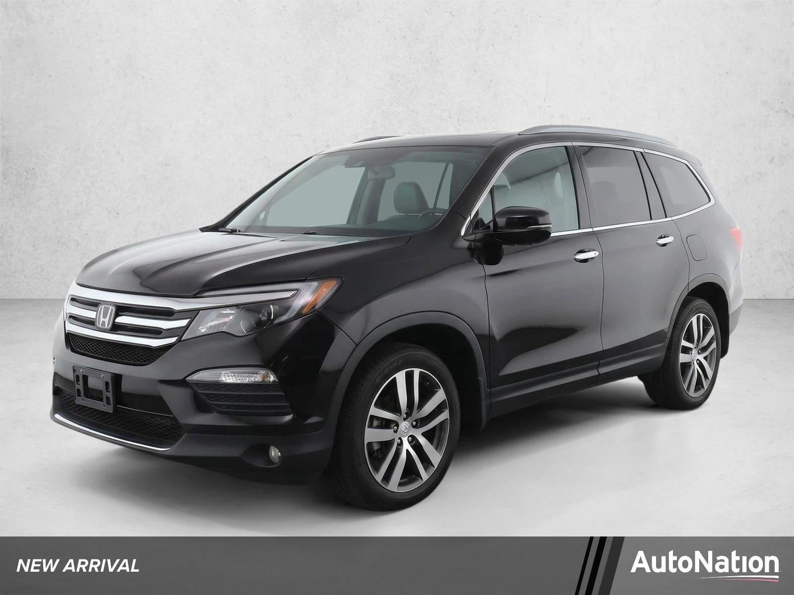 2016 Honda Pilot AWD Touring with DVD Rear Entertainment System and Navigation