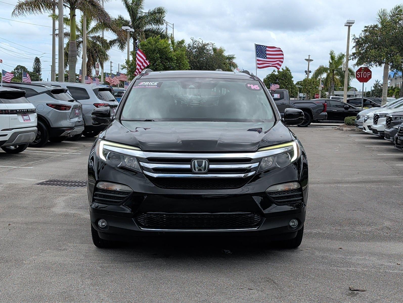2016 Honda Pilot AWD Touring with DVD Rear Entertainment System and Navigation
