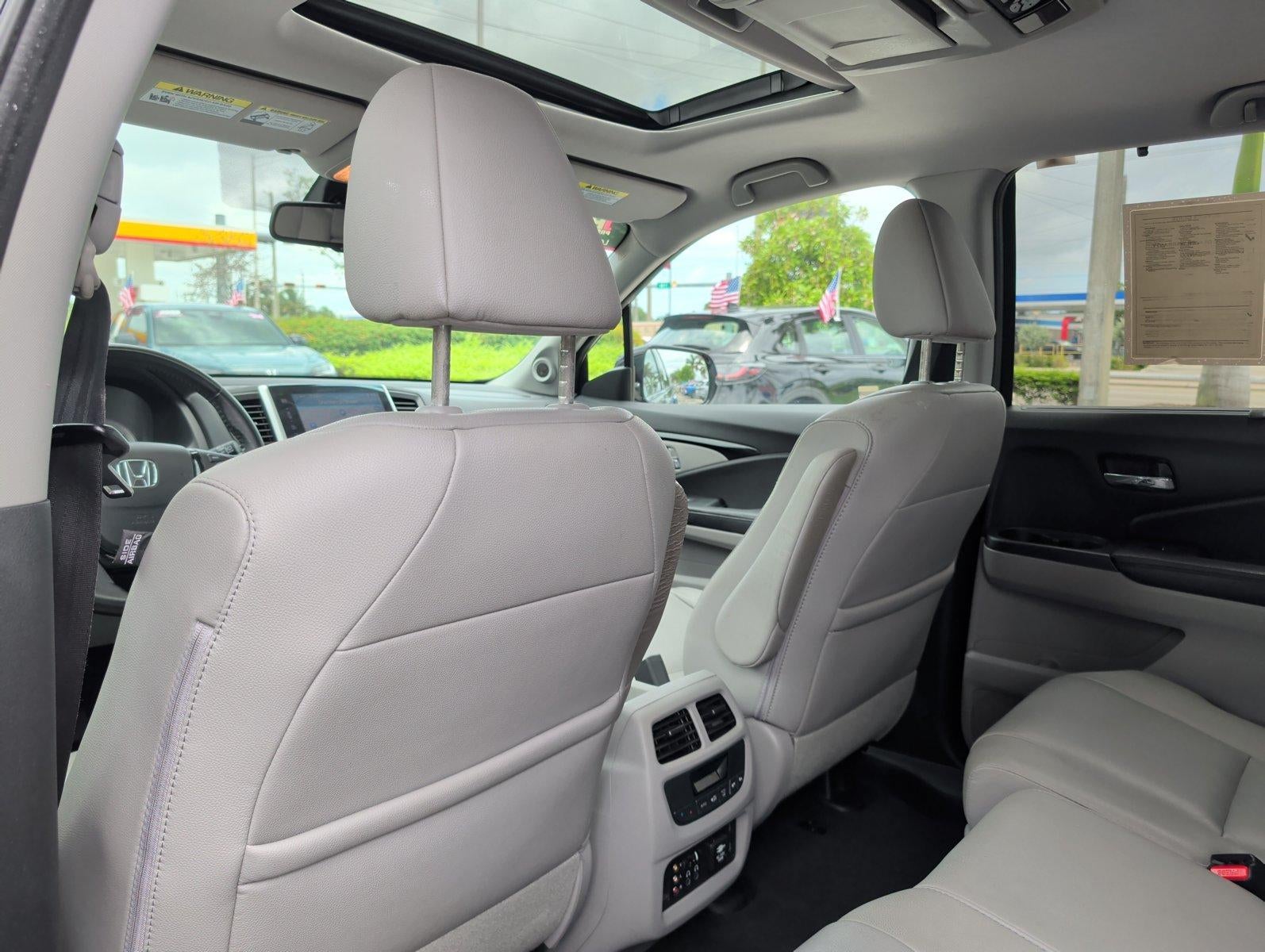 2016 Honda Pilot AWD Touring with DVD Rear Entertainment System and Navigation