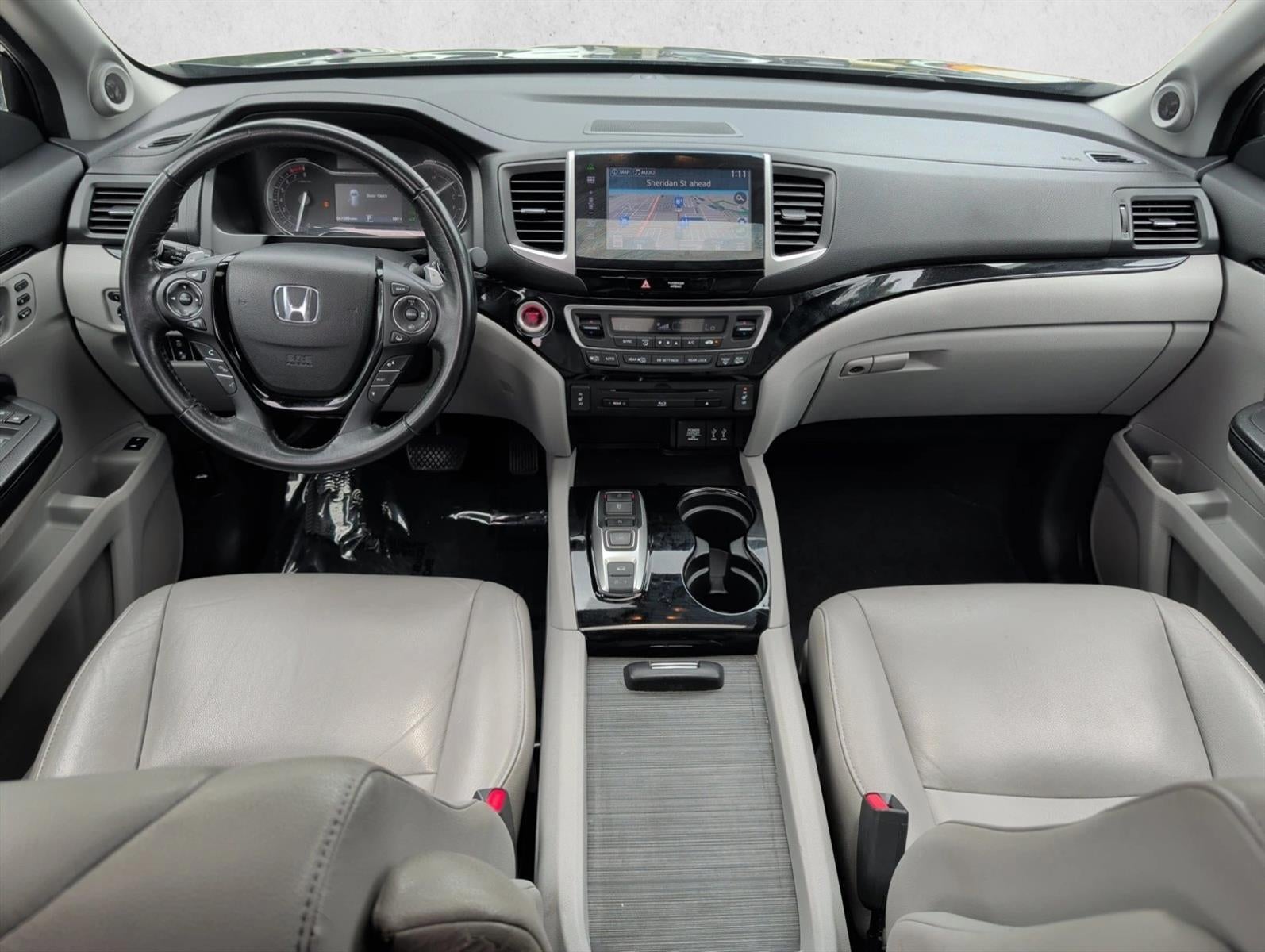 2016 Honda Pilot AWD Touring with DVD Rear Entertainment System and Navigation