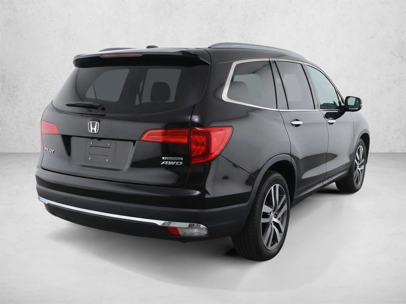2016 Honda Pilot AWD Touring with DVD Rear Entertainment System and Navigation