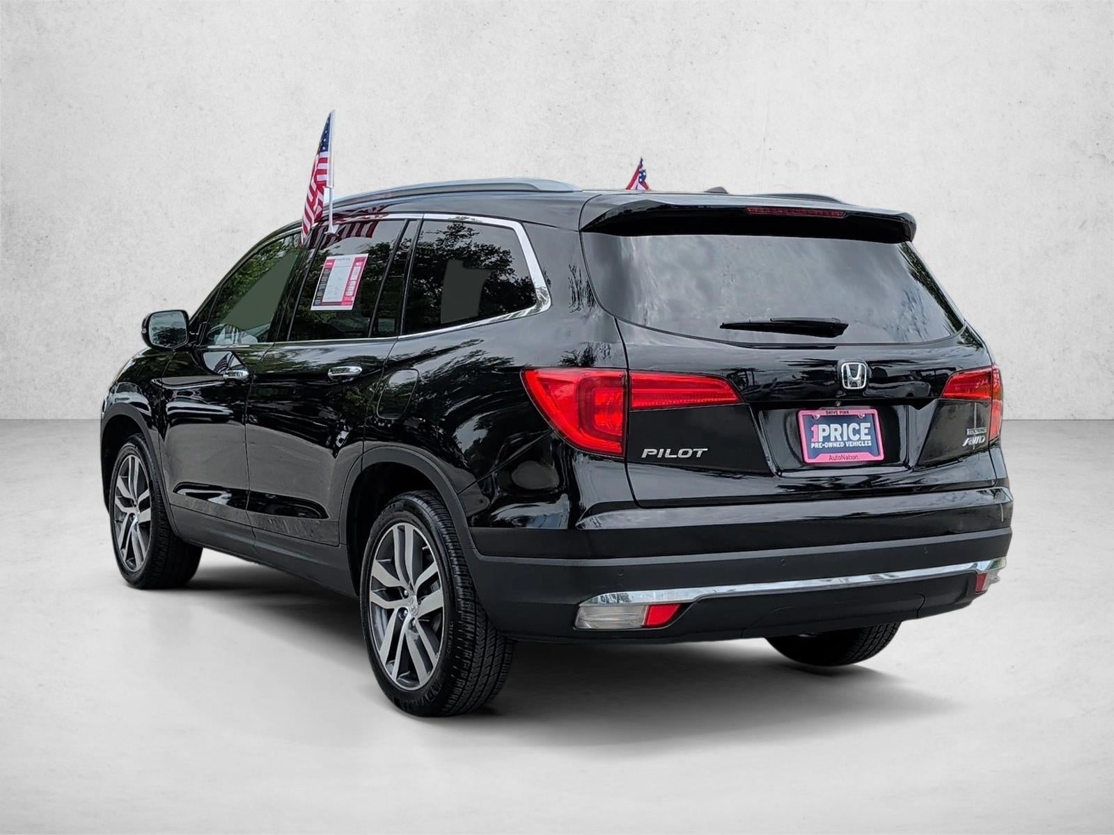 2016 Honda Pilot AWD Touring with DVD Rear Entertainment System and Navigation