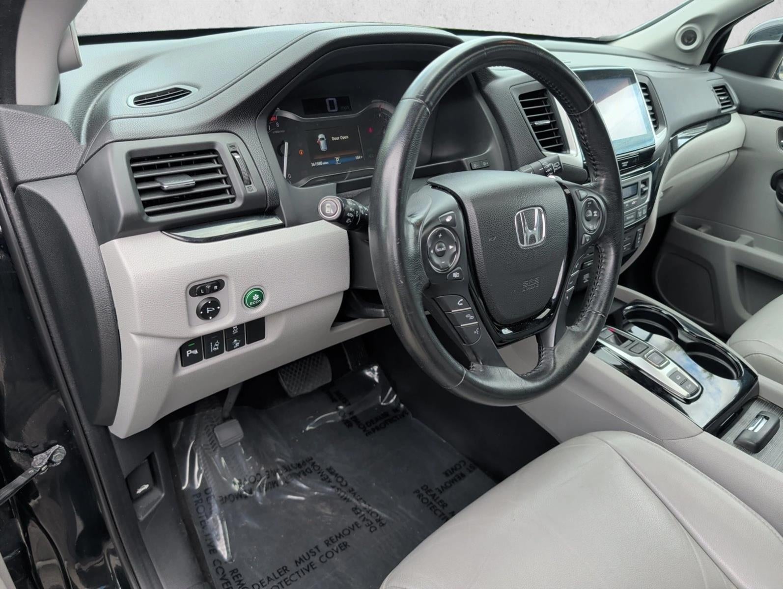 2016 Honda Pilot AWD Touring with DVD Rear Entertainment System and Navigation